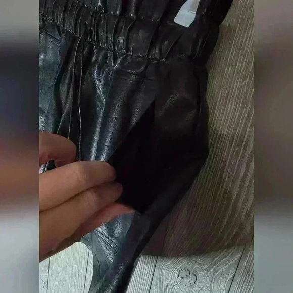 Faux leather high waisted shorts with elastic waist band size small fits a 4-6. - Picture 2 of 4